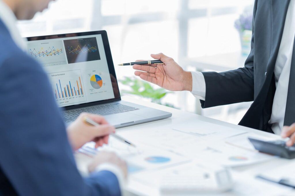 Accountant analyzing financial reports and managing business accounts