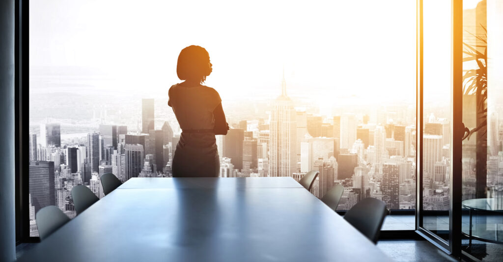 Business people registering a new company with documents and laptop on desk