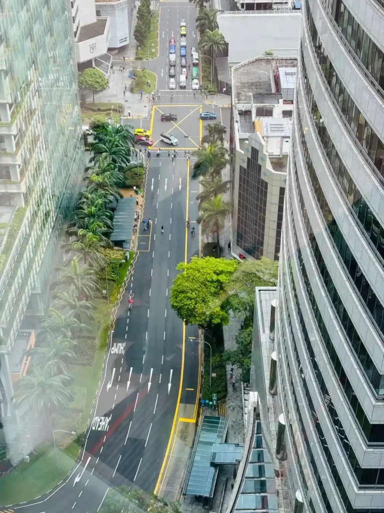 Panoramic street view from a high-floor serviced office in Singapore